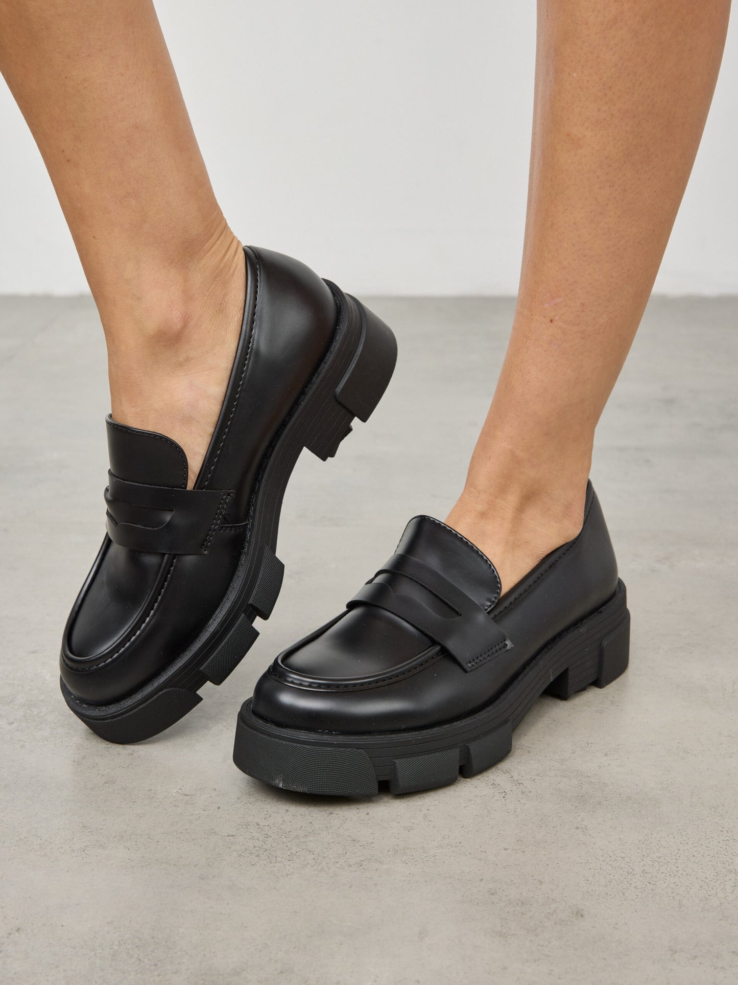 מוקסין סוליית טרקטור קלוד | שחור