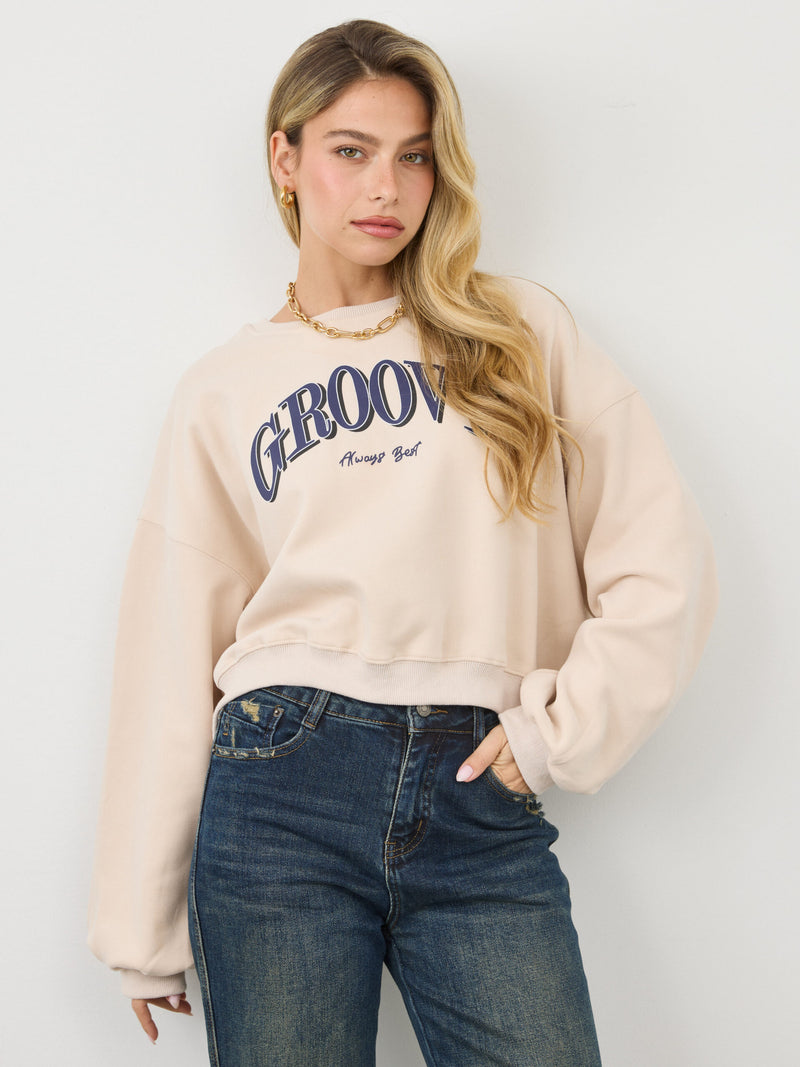 סווטשירט עם כיתוב GROOVY | בז'