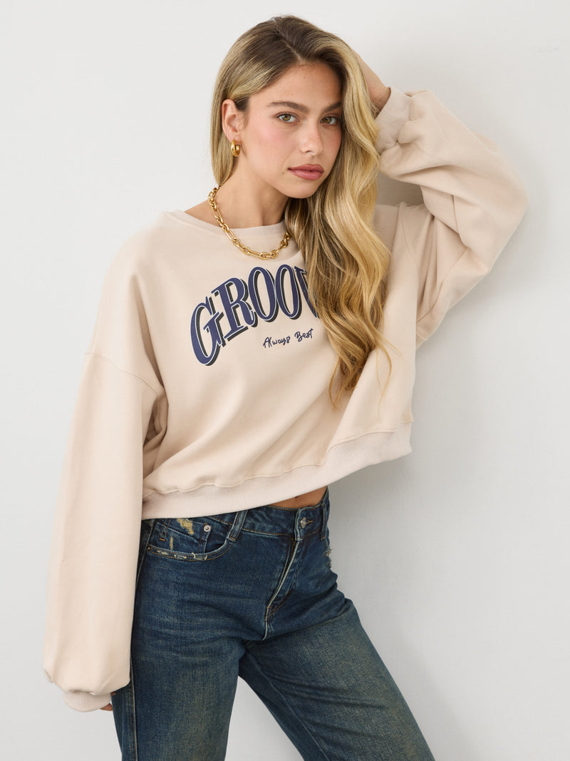 סווטשירט עם כיתוב GROOVY | בז'